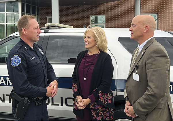 police officer, Ashby, and other consultant